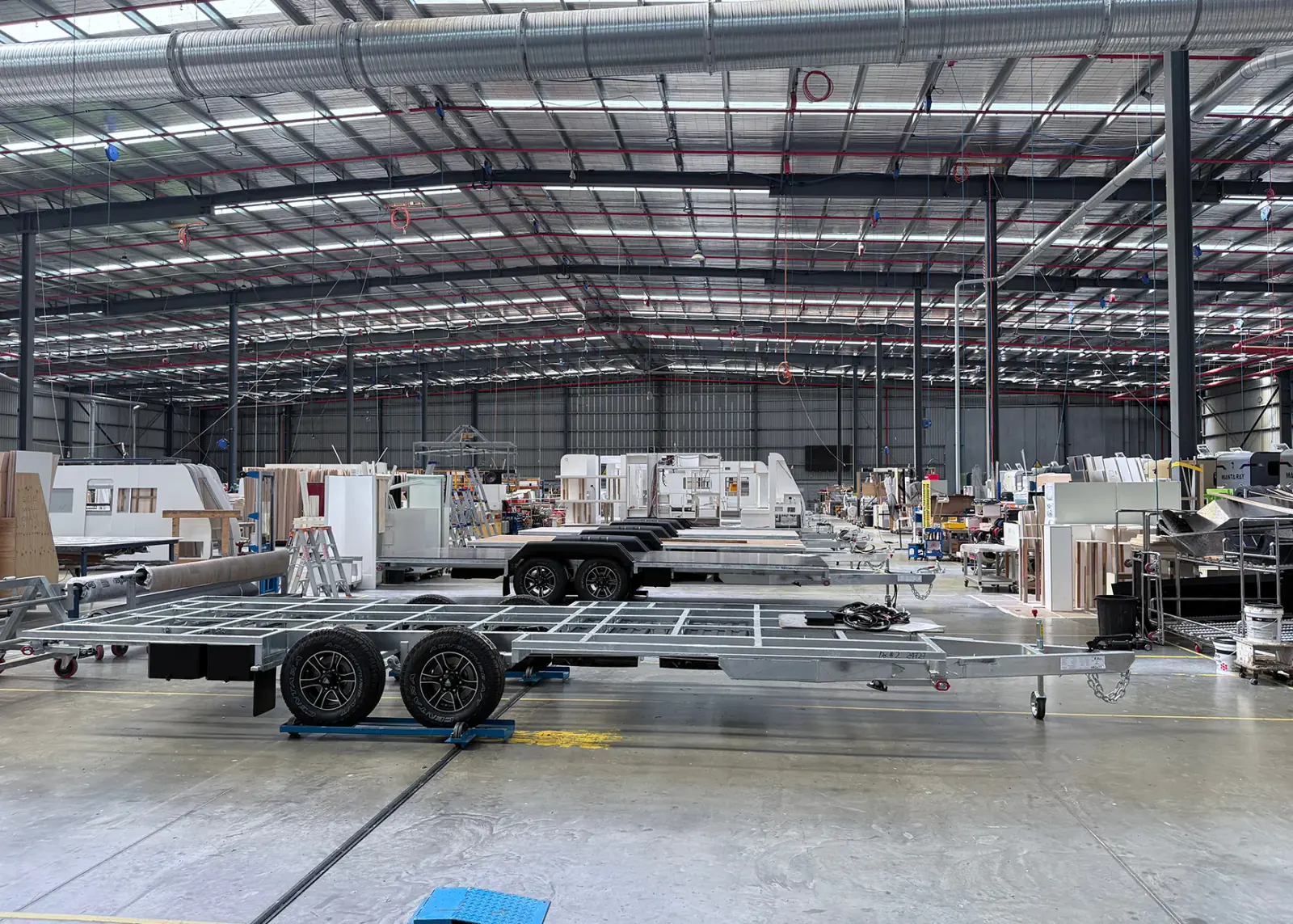 A caravan mid-build on the line